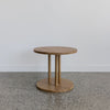round disc wooden side table by corcovado furniture made from natural teak wood