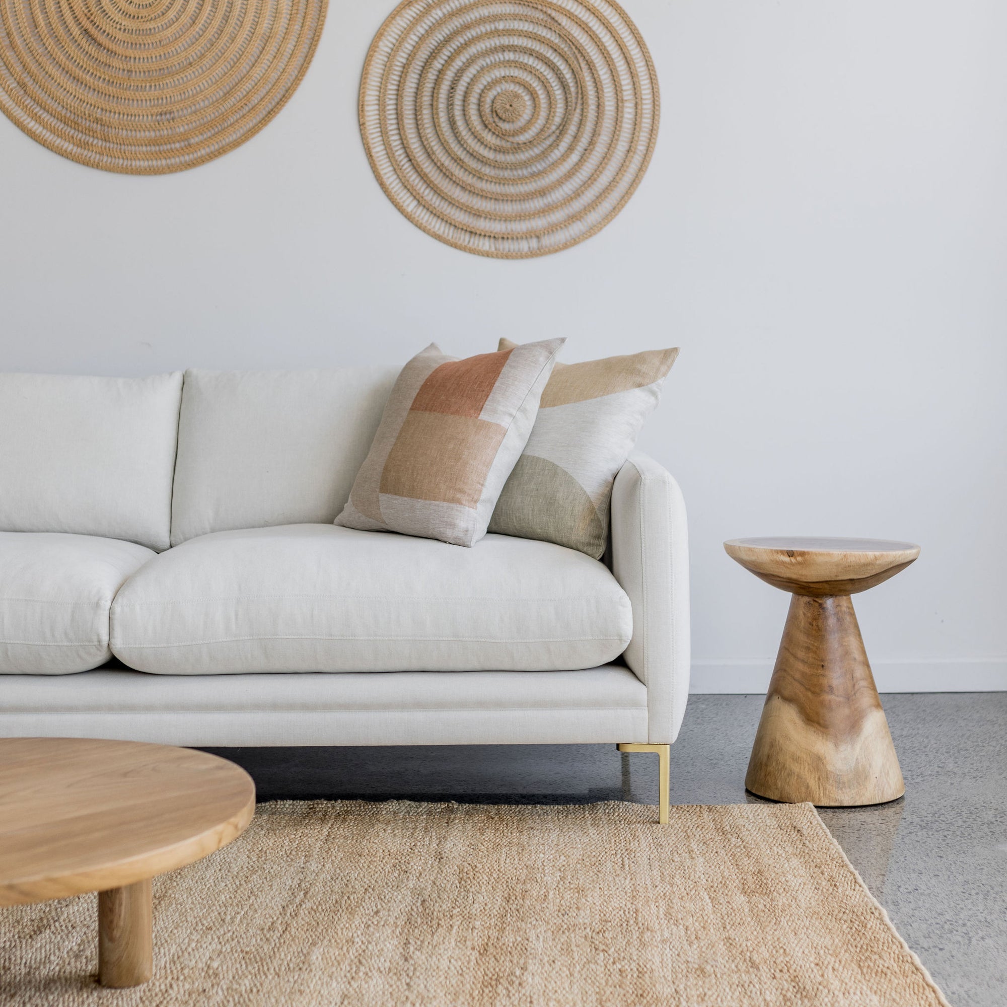 white nz made sofa and a natural suar wood side table corcovado furniture store new zealand