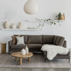 round coffee table and white sofa from christchurch and auckland coastal decor brand corcovado furniture and homewares nz