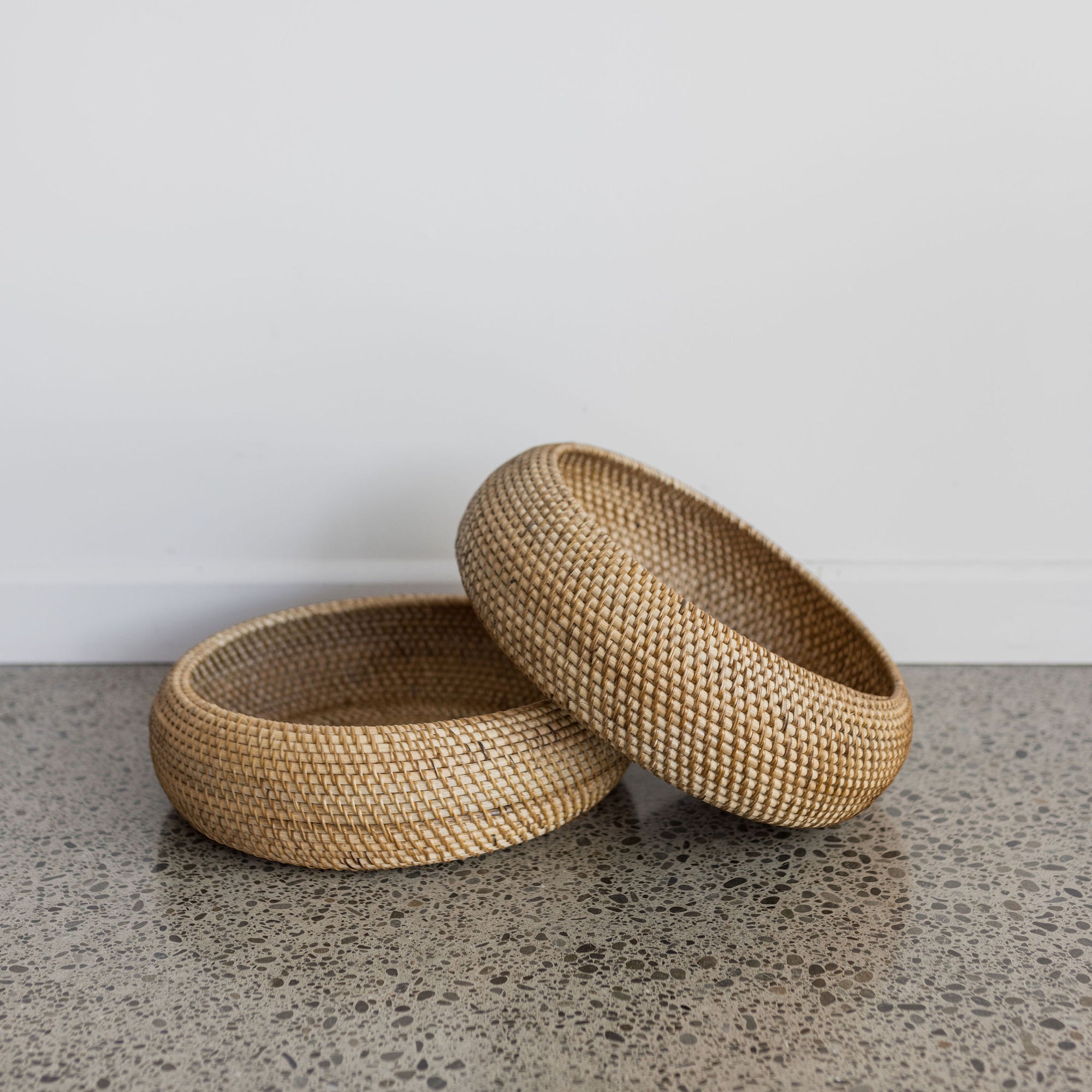 from corcovado a handwoven round rattan fruit bowl in a natural rattan finish