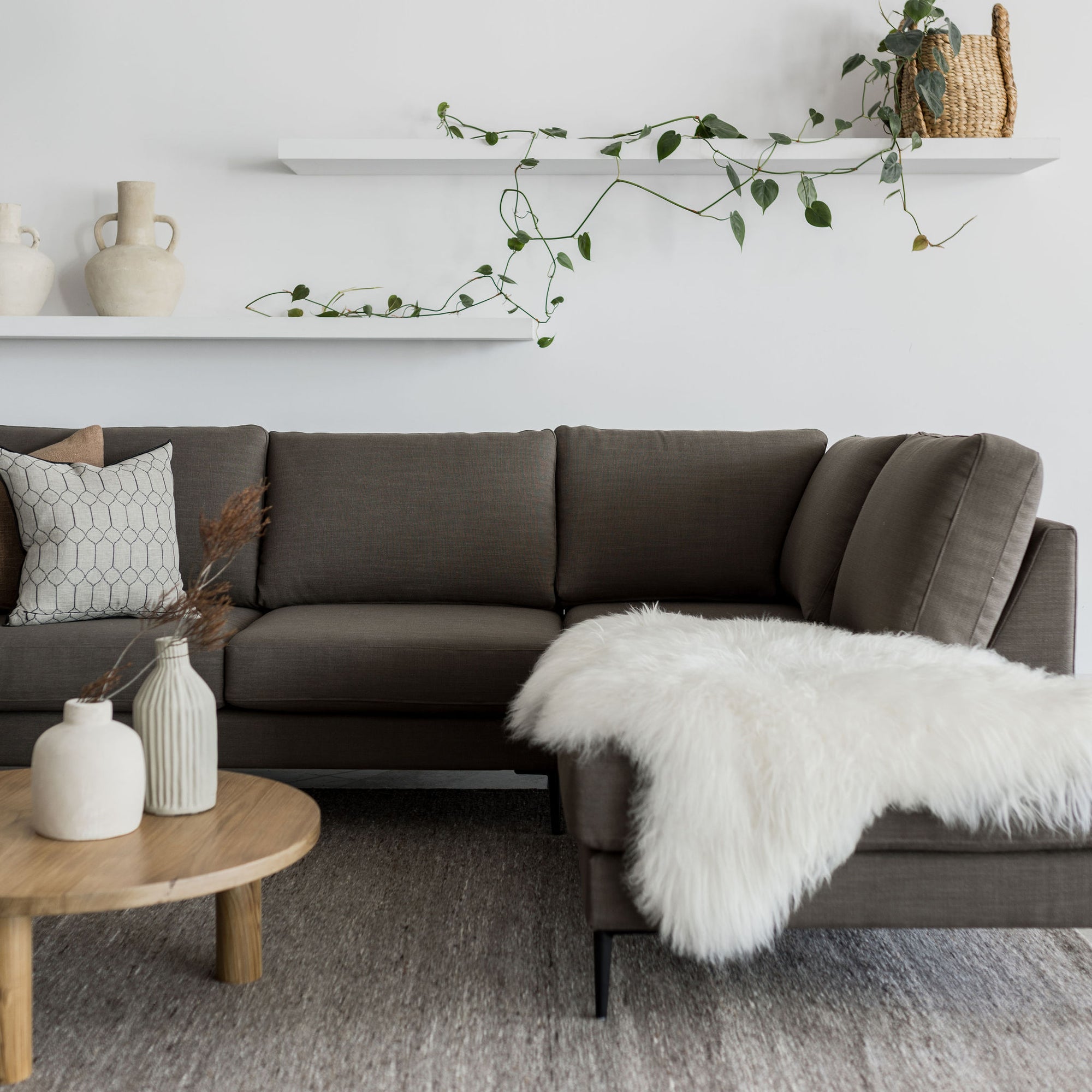corner sofa with chaise from corcovado store new zealand online and also a white icelandic sheepskin throw rug 