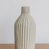 close up photo of the tall ribbed vase by corcovado furniture and homewares store