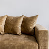 close up view of sunset 4 seater sofa made in new zealand by corcovado furniture store shown in gold velvet