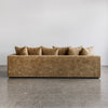 sunset 4 seater sofa made in new zealand by corcovado furniture store with the back of the sofa shown in gold velvet