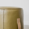 round leather pouff ottoman with leather handle corcovado furniture auckland christchurch