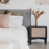 linen headboard and rattan bedside table by corcovado furniture store new zealand