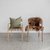 leather arm chairs and green cushion from corcovado furniture store new zealand
